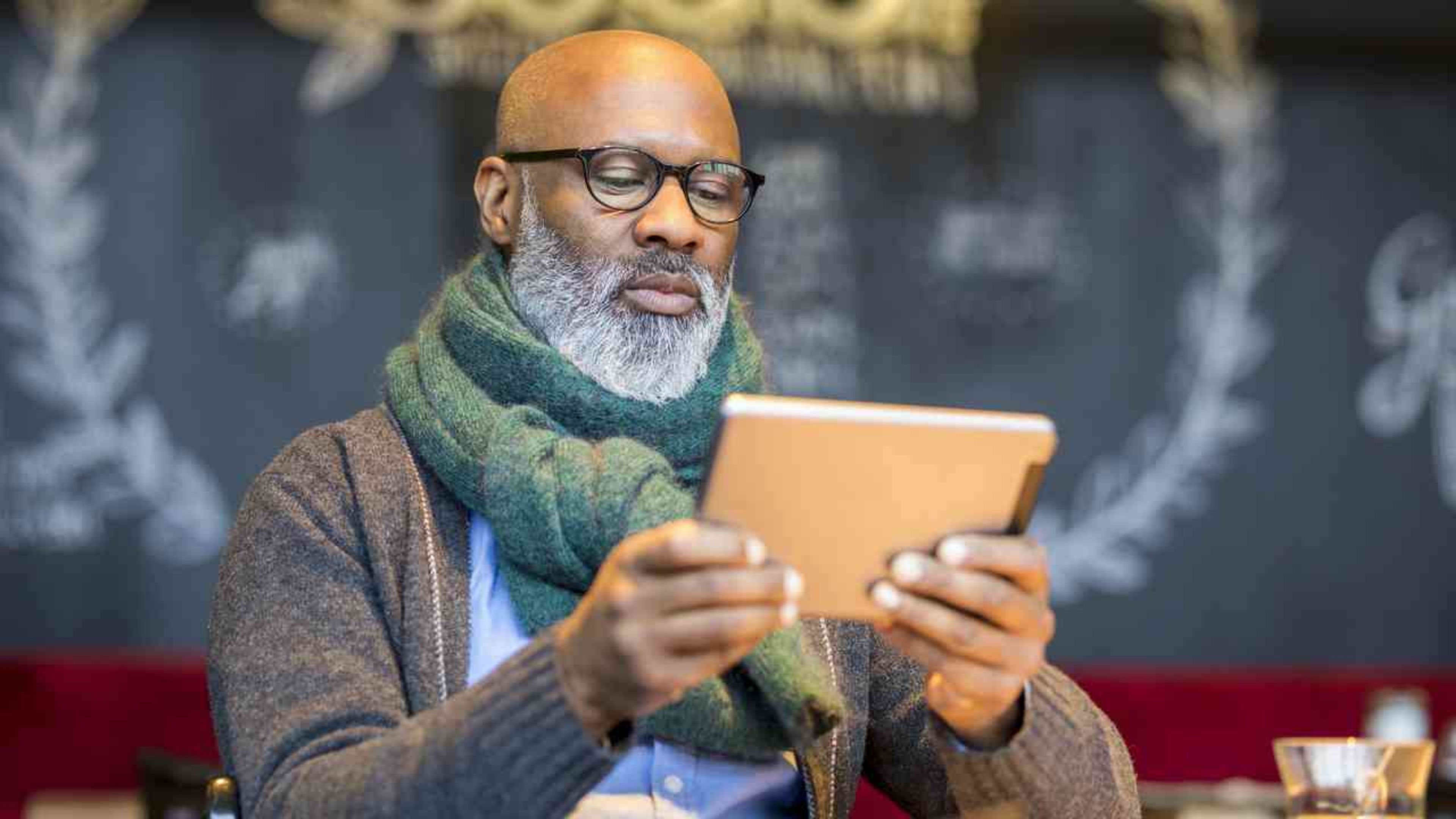 Portrait Of Man Using Tablet In A Coffee Shop 2022 12 16 22 06 19 Utc